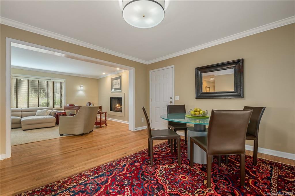 199 Chestnut Street Tryon, NC 28782 - Photo 13 of 29 a living room with furniture and a wooden floor