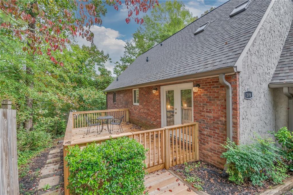 199 Chestnut Street Tryon, NC 28782 - Photo 3 of 29 front view of a house with a large window