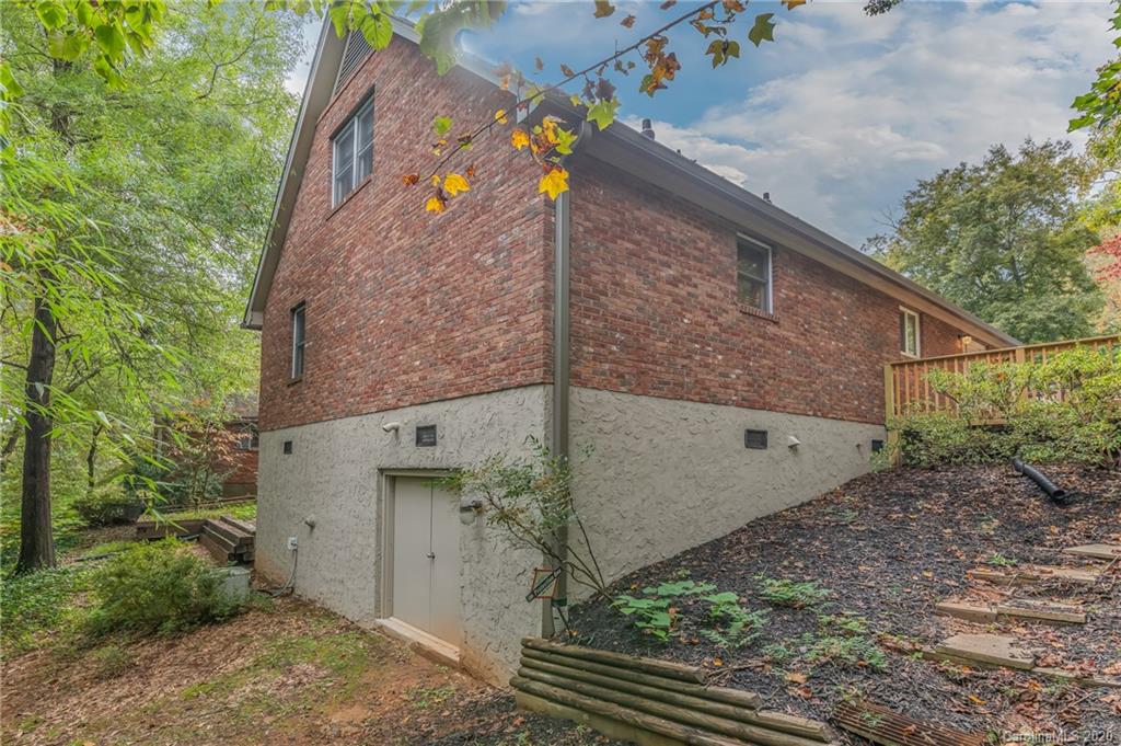 199 Chestnut Street Tryon, NC 28782 - Photo 27 of 29 a view of a back yard of the house