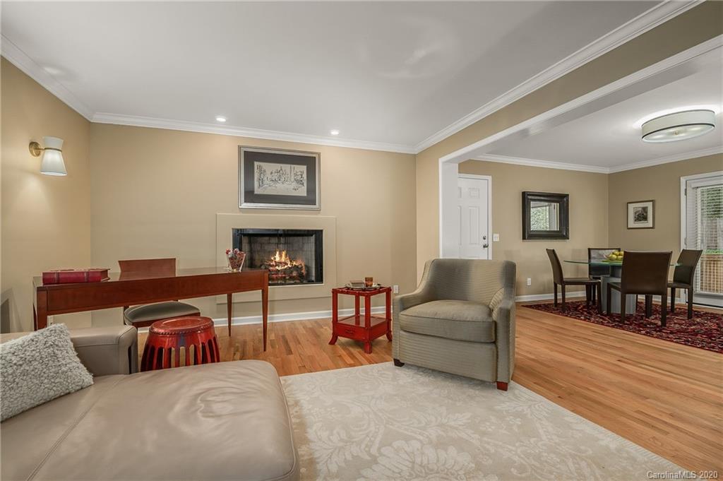 199 Chestnut Street Tryon, NC 28782 - Photo 7 of 29 a living room with furniture and a fireplace