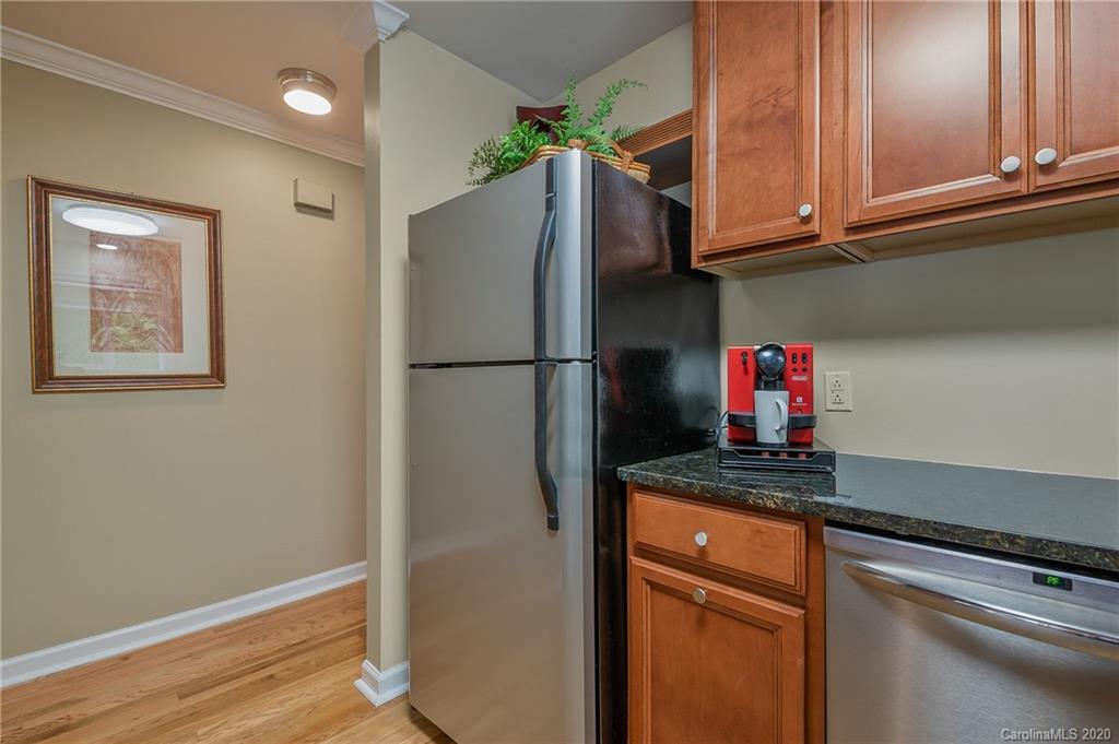 199 Chestnut Street Tryon, NC 28782 - Photo 10 of 29 a kitchen with stainless steel appliances granite countertop a refrigerator and a stove top oven
