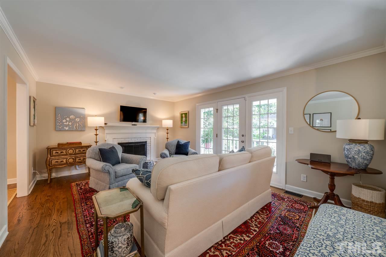 808 Davidson Street Raleigh, NC 27609 - Photo 11 of 30 a living room with furniture and a fireplace