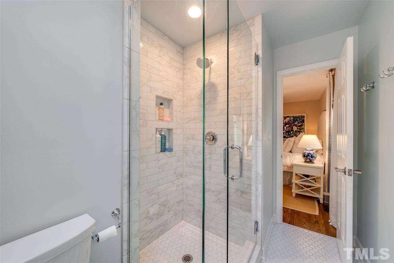 808 Davidson Street Raleigh, NC 27609 - Photo 16 of 30 a bathroom with a shower and a sink
