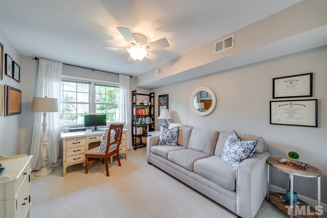 808 Davidson Street Raleigh, NC 27609 - Photo 24 of 30 a living room with furniture and a window