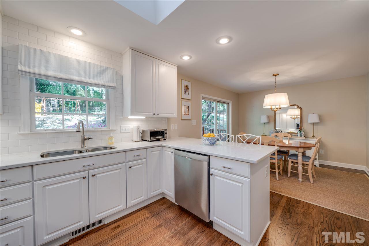 808 Davidson Street Raleigh, NC 27609 - Photo 9 of 30 a kitchen with sink and cabinets