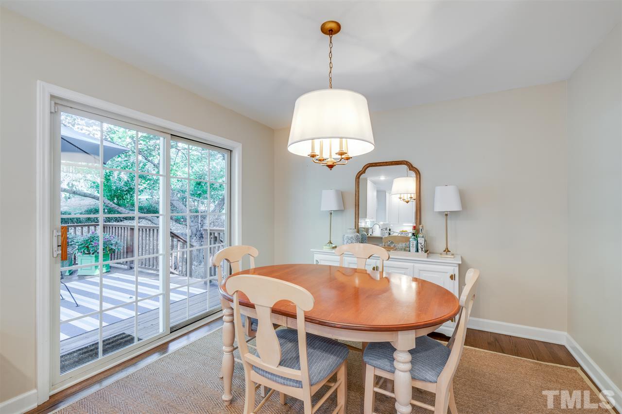 808 Davidson Street Raleigh, NC 27609 - Photo 10 of 30 a view of a dining room with furniture window and outside view