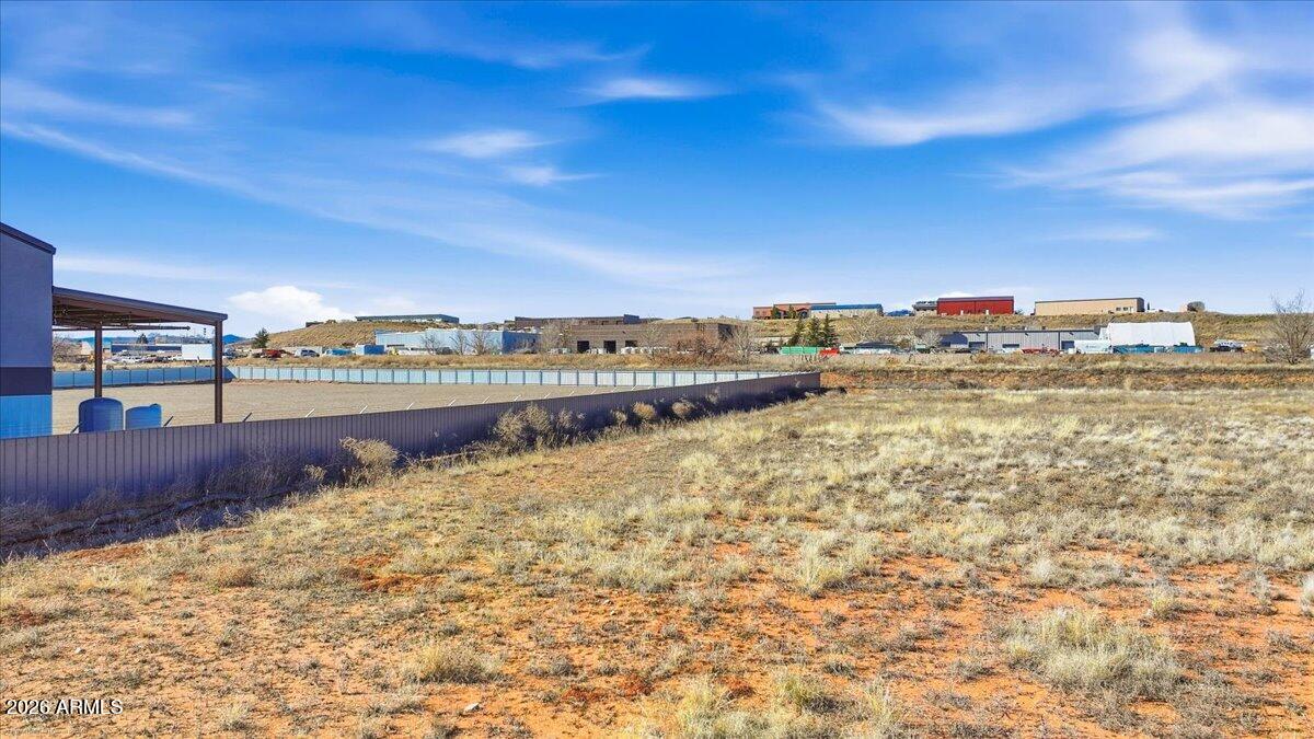 6734 Generation Lane, Unit 8 Prescott, AZ 86301 - Photo 5 of 18 a view of a building with mountains in the background