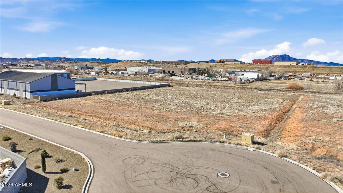 6734 Generation Lane, Unit 8 Prescott, AZ 86301 - Photo 7 of 18 an aerial view of residential houses with outdoor space