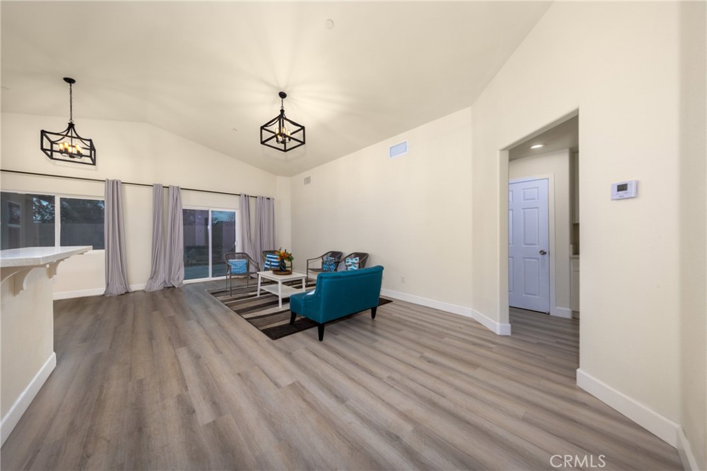 16241 Chestnut Street Hesperia, CA 92345 - Photo 11 of 60 a living room with furniture and wooden floor