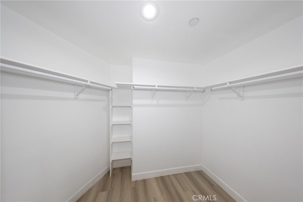 16241 Chestnut Street Hesperia, CA 92345 - Photo 24 of 60 a view of an empty walk in closet