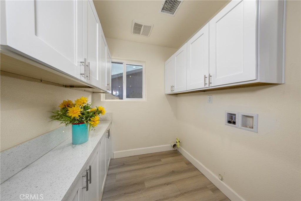 16241 Chestnut Street Hesperia, CA 92345 - Photo 25 of 60 a view of entryway with wooden floor