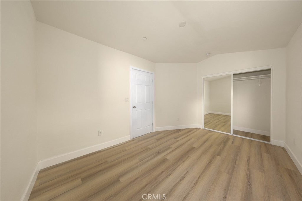 16241 Chestnut Street Hesperia, CA 92345 - Photo 28 of 60 a view of empty room with wooden floor