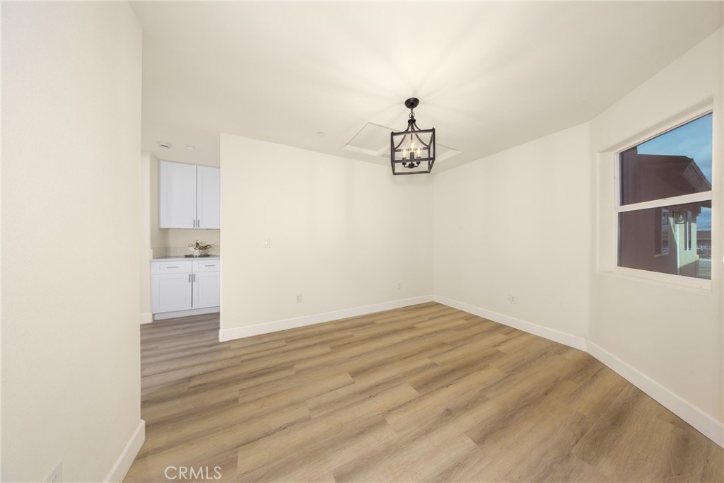 16241 Chestnut Street Hesperia, CA 92345 - Photo 31 of 60 a view of empty room with wooden floor