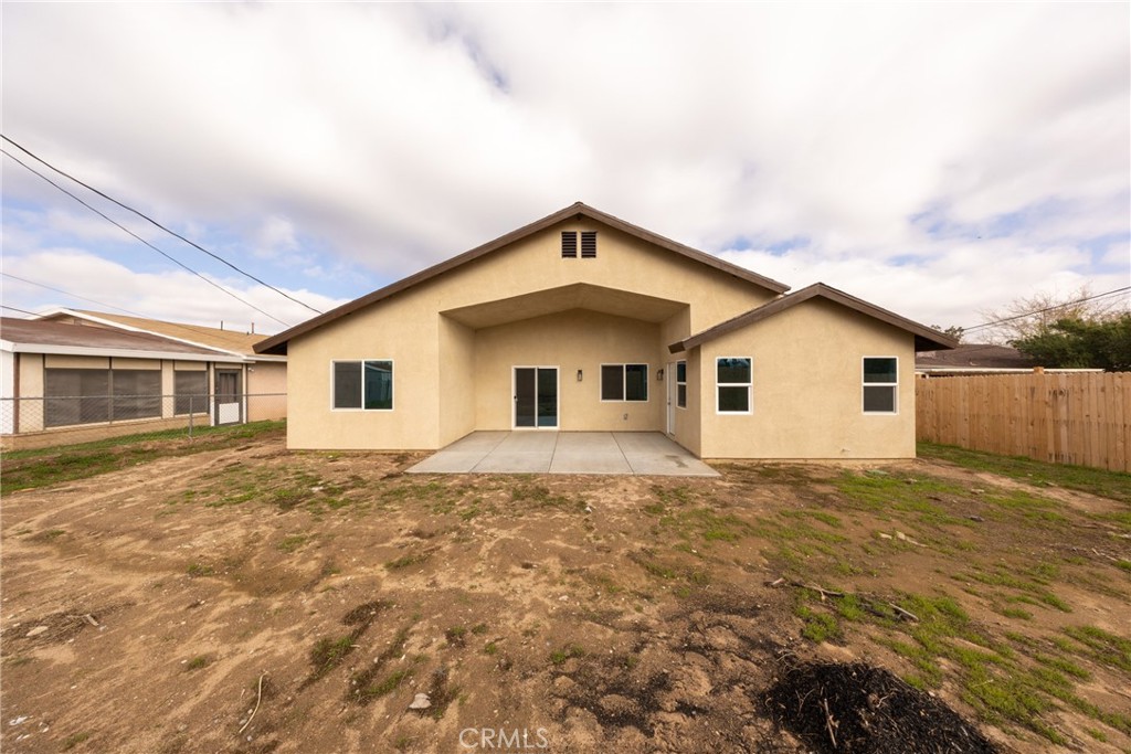 16241 Chestnut Street Hesperia, CA 92345 - Photo 40 of 60 a view of a house with a yard
