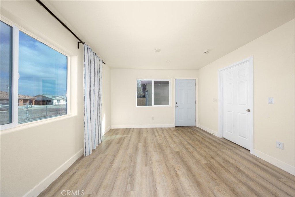 16241 Chestnut Street Hesperia, CA 92345 - Photo 44 of 60 a view of an empty room with a window