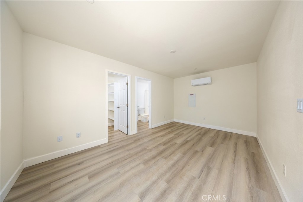 16241 Chestnut Street Hesperia, CA 92345 - Photo 46 of 60 a view of an empty room and wooden floor