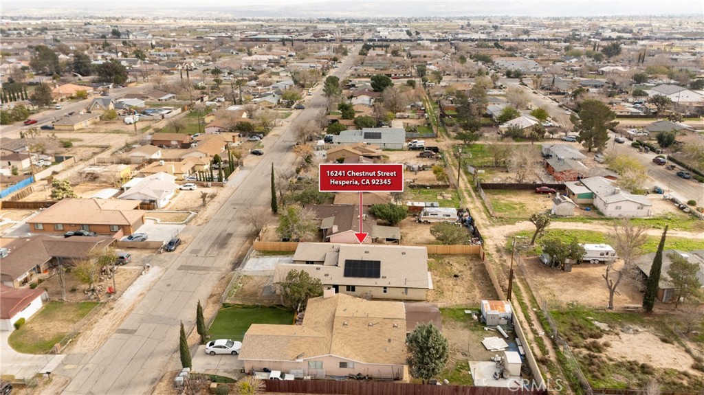16241 Chestnut Street Hesperia, CA 92345 - Photo 56 of 60 an aerial view of residential houses with city view