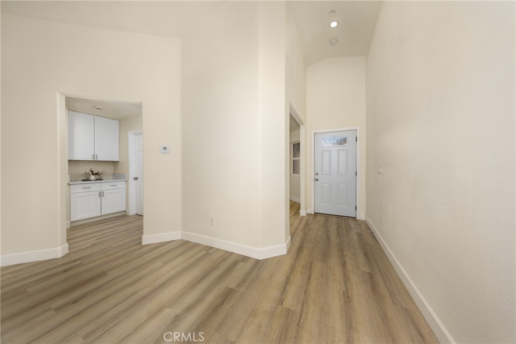 16241 Chestnut Street Hesperia, CA 92345 - Photo 10 of 60 a view of empty room with wooden floor