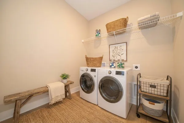 a utility room with dryer and washer