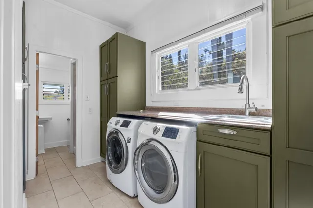 a utility room with dryer and washer