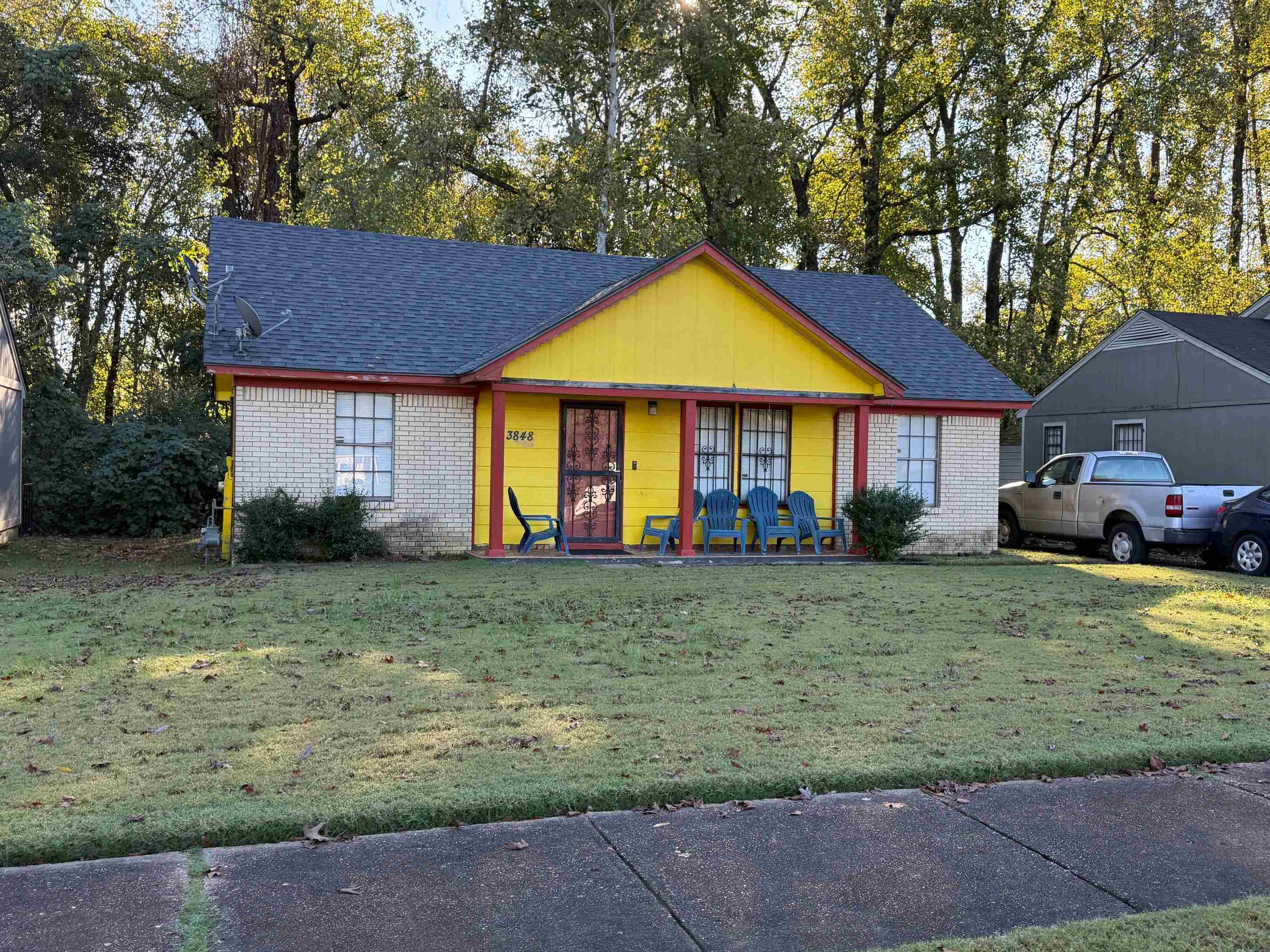 3848 Windermere Road Memphis, TN 38128 - Photo 1 of 1 a front view of a house with a yard and garage