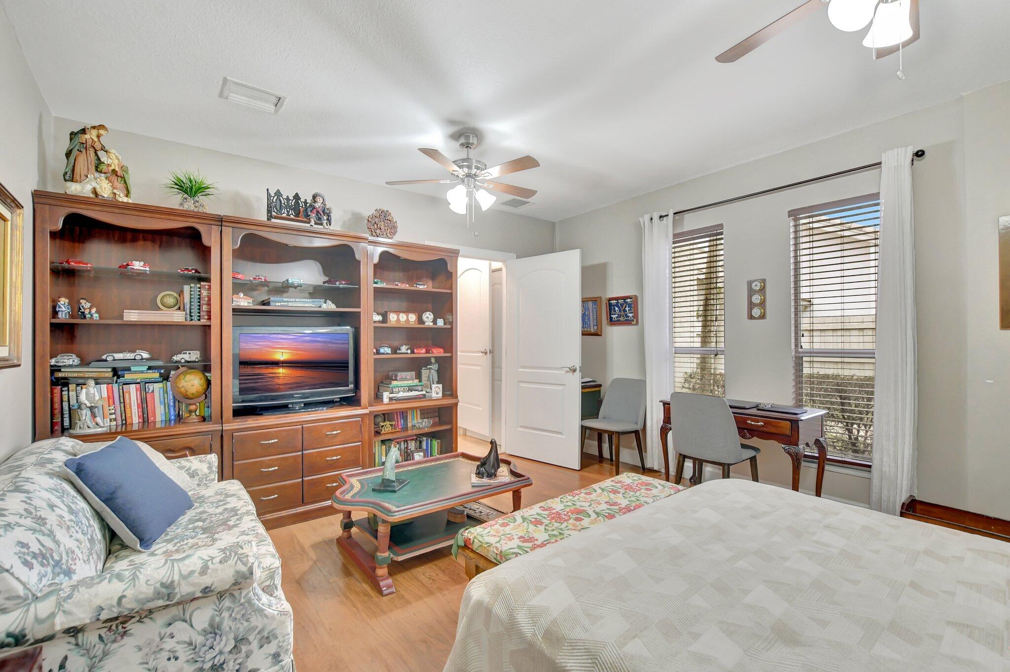 9717 Erica Court Boca Raton, FL 33496 - Photo 11 of 49 a living room with furniture a rug and a chandelier