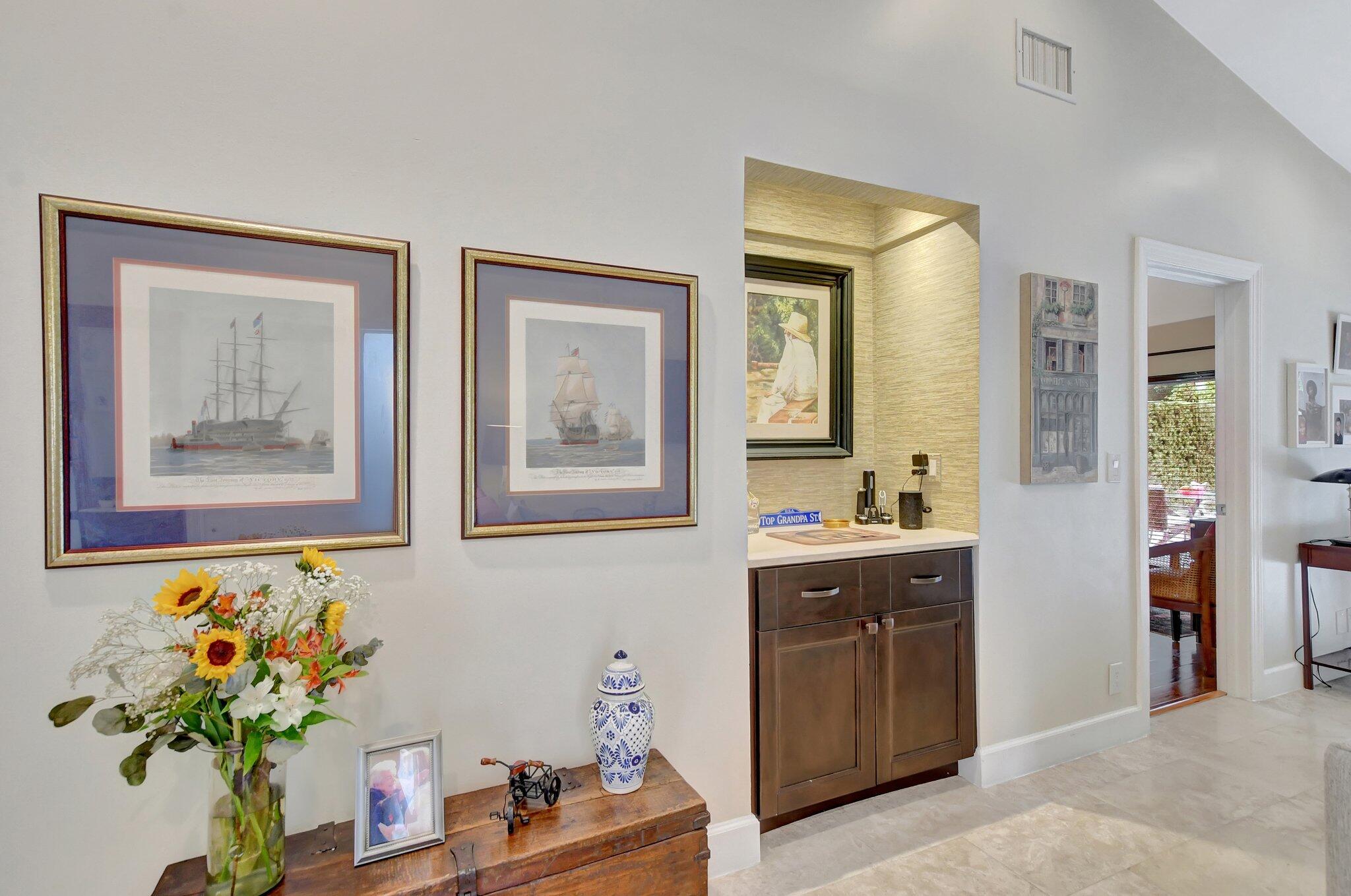 9717 Erica Court Boca Raton, FL 33496 - Photo 20 of 49 a spacious bathroom with a sink mirror and vanity