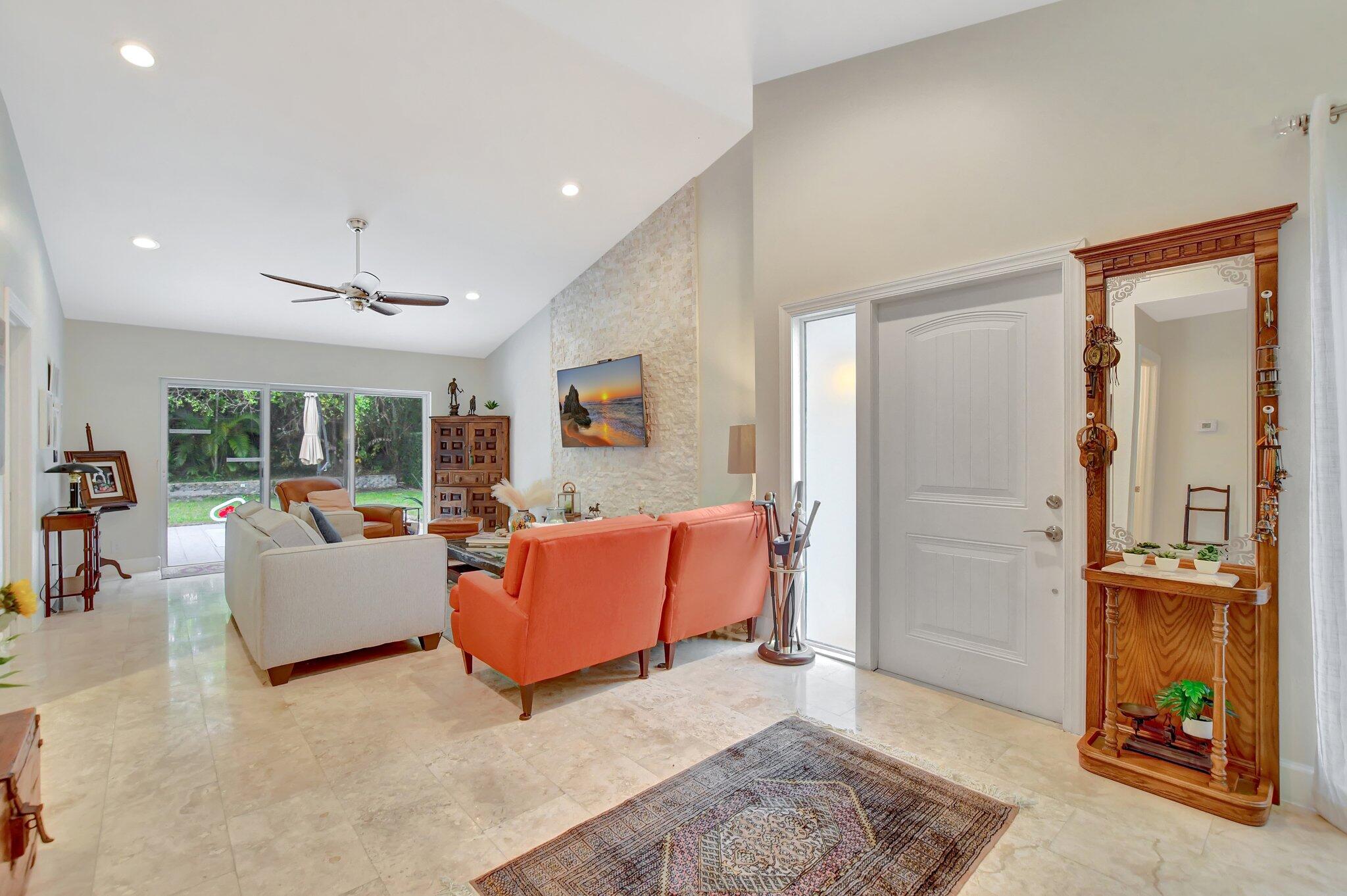 9717 Erica Court Boca Raton, FL 33496 - Photo 36 of 49 a living room with furniture and a area