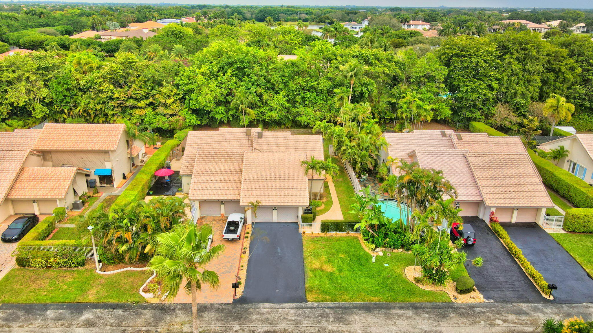 9717 Erica Court Boca Raton, FL 33496 - Photo 4 of 49 an aerial view of a house with a yard basket ball court and outdoor seating