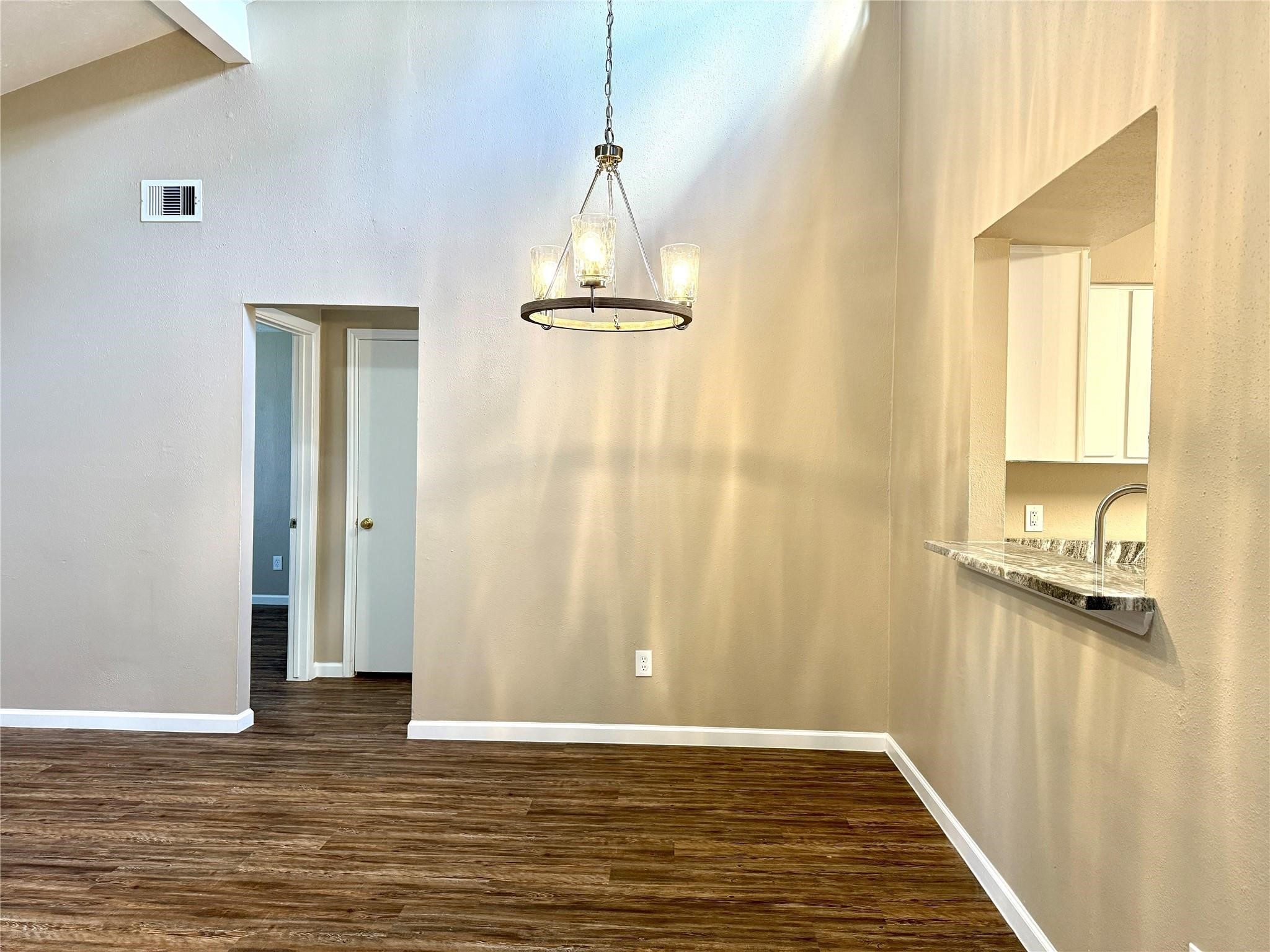 2435 Summer Spring Drive Spring, TX 77373 - Photo 5 of 16 a view of a livingroom with wooden floor and a window