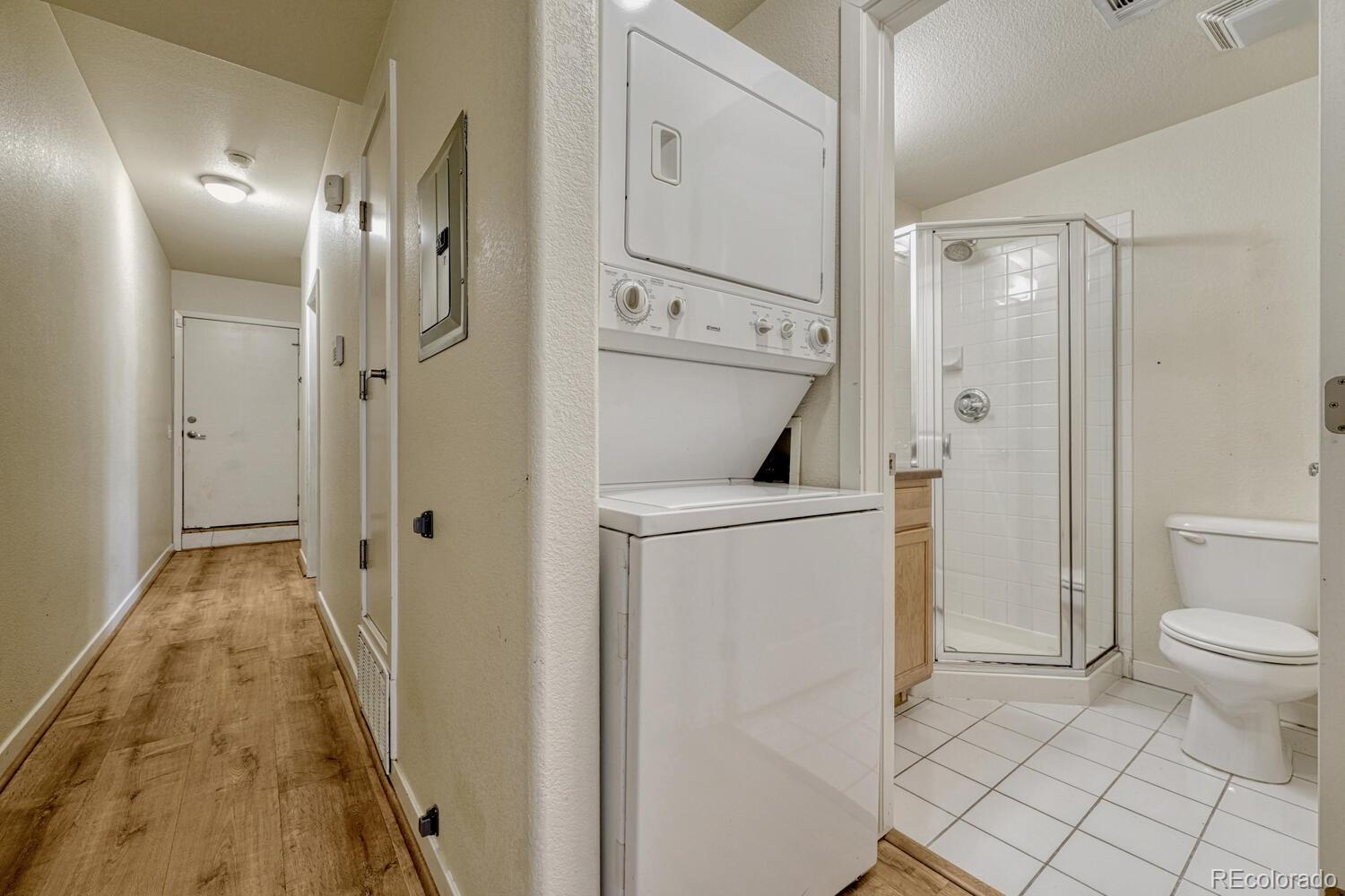 2389 South High Street, Unit 4 Denver, CO 80210 - Photo 11 of 27 a bathroom with a sink and a toilet