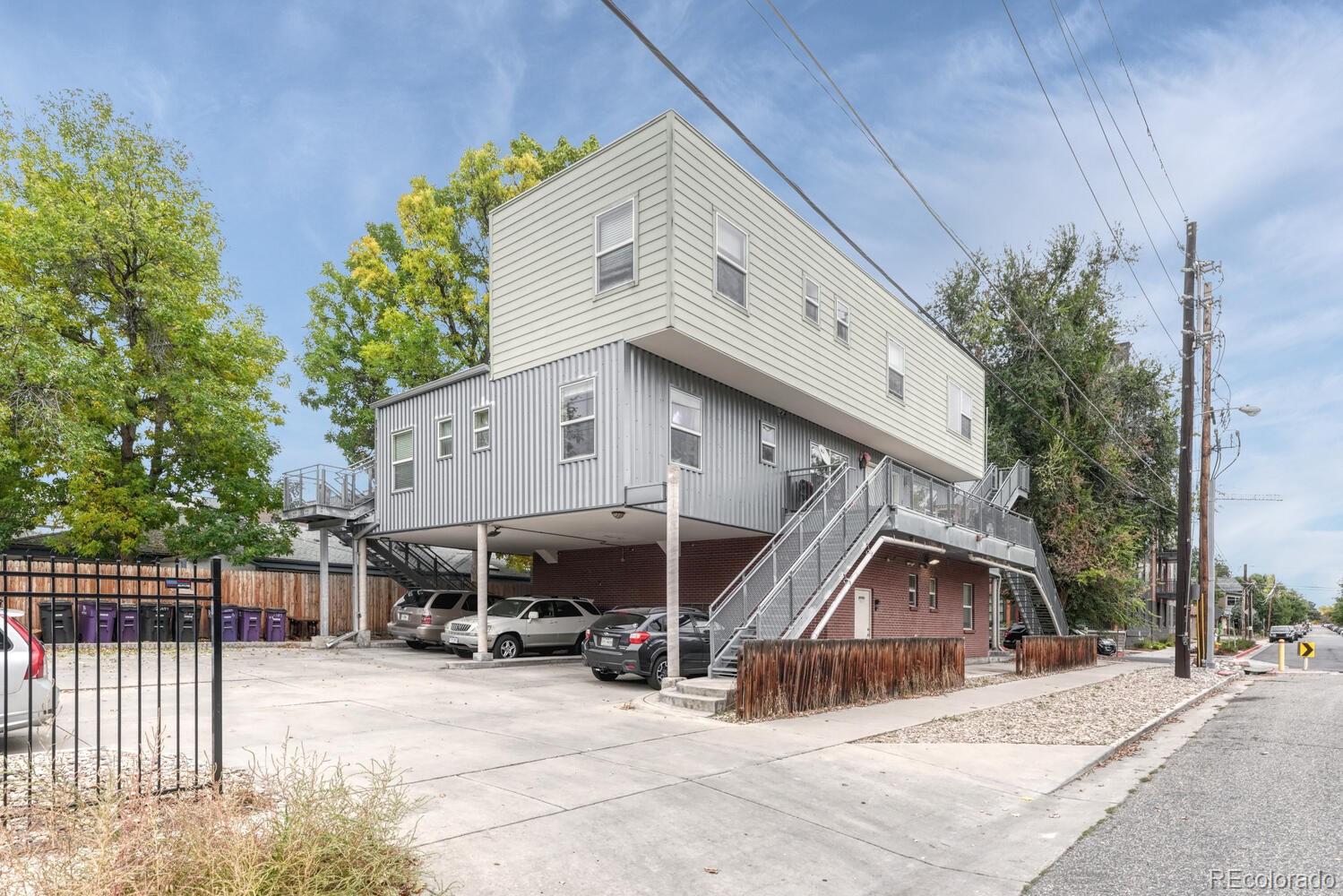 2389 South High Street, Unit 4 Denver, CO 80210 - Photo 23 of 27 a view of a house with wooden fence