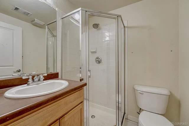 a bathroom with a sink a toilet and a bathtub
