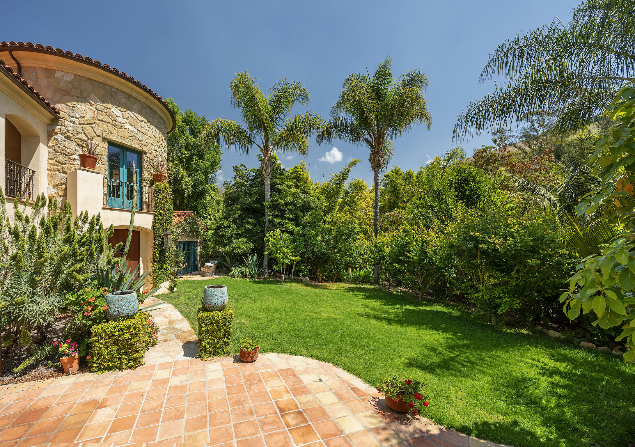 1493 Sycamore Canyon Road Montecito, CA 93108 - Photo 43 of 47 a view of a backyard with plants