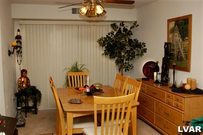 1575 Creekside Road, Unit A19 Whitehall, PA 18052 - Photo 3 of 6 Dining room leading to patio near the pool
