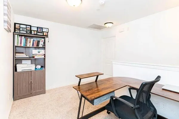 a view of a livingroom with furniture