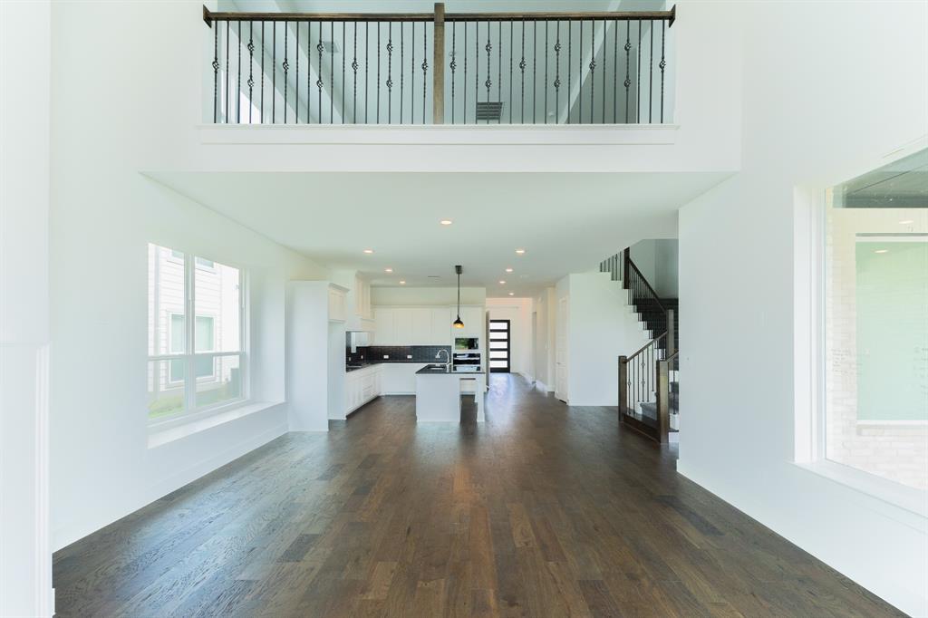 3020 Sunfish Street Prosper, TX 75078 - Photo 14 of 34 an empty room with wooden floor and a window