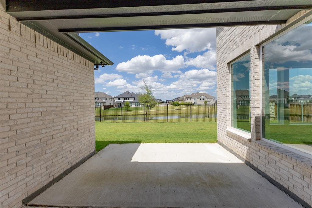 3020 Sunfish Street Prosper, TX 75078 - Photo 27 of 34 a view of a house with a yard