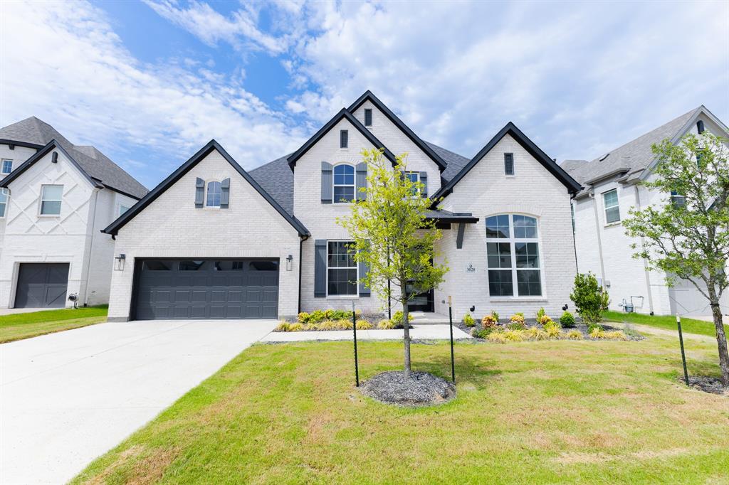 3020 Sunfish Street Prosper, TX 75078 - Photo 3 of 34 a view of house with yard and tree in front of it