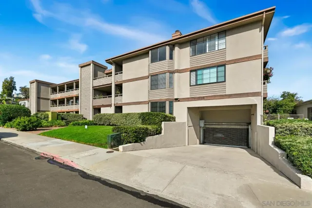 a view of a chairs and table in the patio