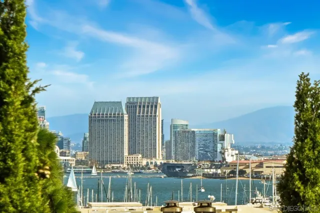 a view of a city with tall buildings