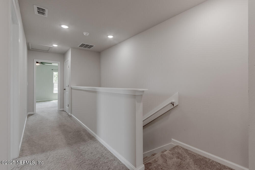 14438 Macadamia Lane Jacksonville, FL 32218 - Photo 15 of 32 a view of hallway