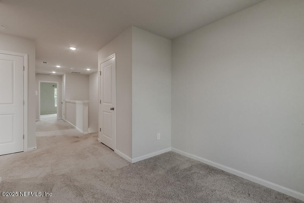 14438 Macadamia Lane Jacksonville, FL 32218 - Photo 23 of 32 a view of an empty room
