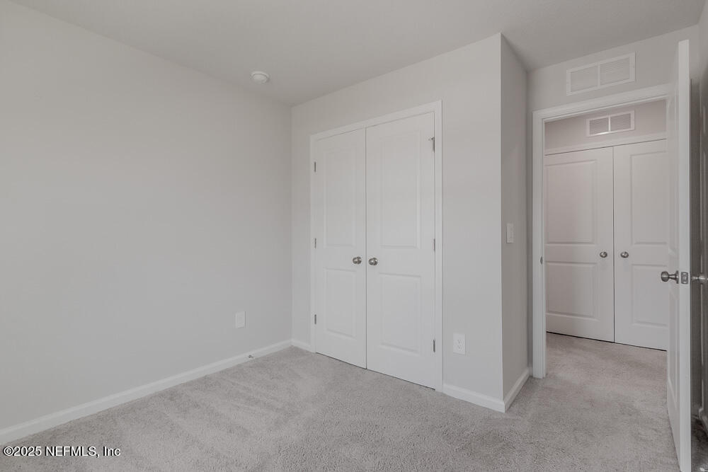 14438 Macadamia Lane Jacksonville, FL 32218 - Photo 27 of 32 a view of an empty room