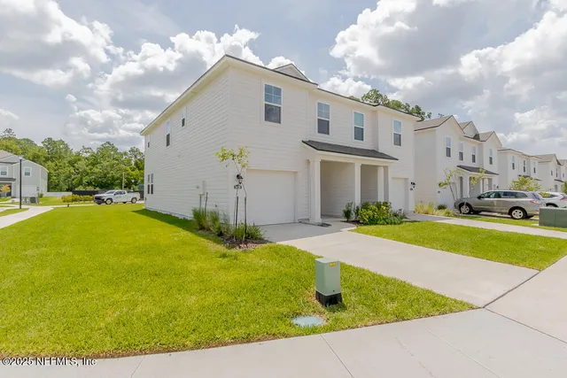 a view of outdoor space yard and swimming pool