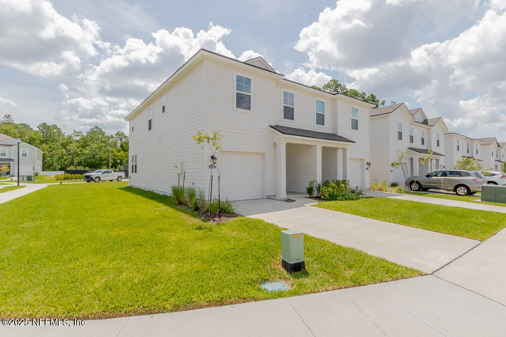 14438 Macadamia Lane Jacksonville, FL 32218 - Photo 5 of 32 a view of outdoor space yard and swimming pool