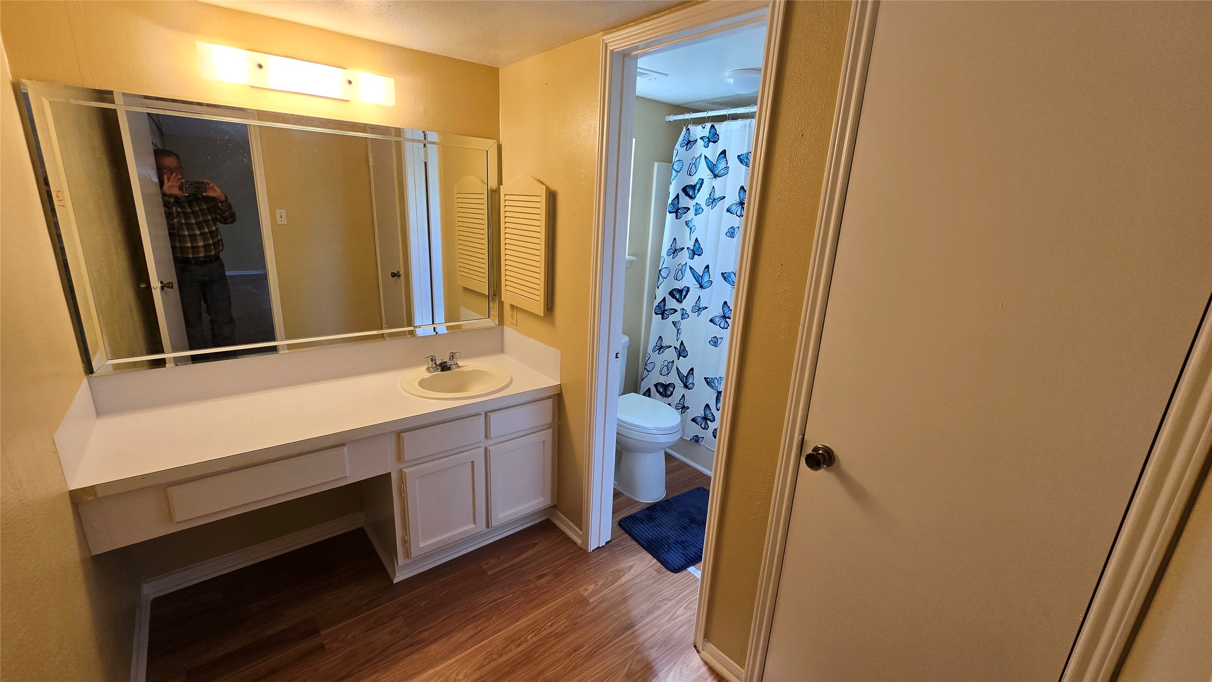 135 April Point Drive North Conroe, TX 77356 - Photo 15 of 28 a bathroom with a sink a mirror and a shower