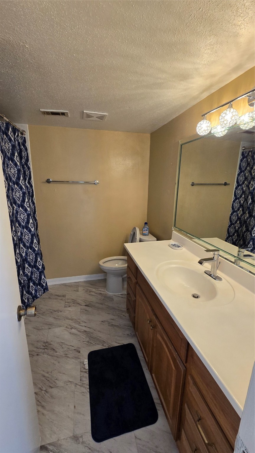 135 April Point Drive North Conroe, TX 77356 - Photo 6 of 28 a bathroom with a sink and a mirror