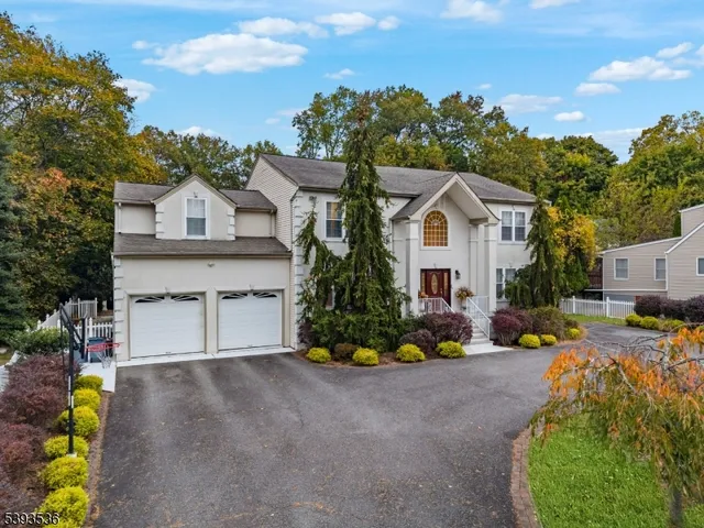 a view of a house with a outdoor space and sitting area