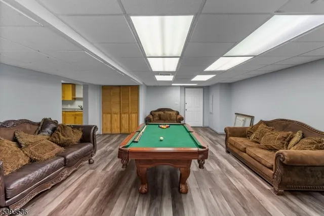 a view of a patio with a table and chairs